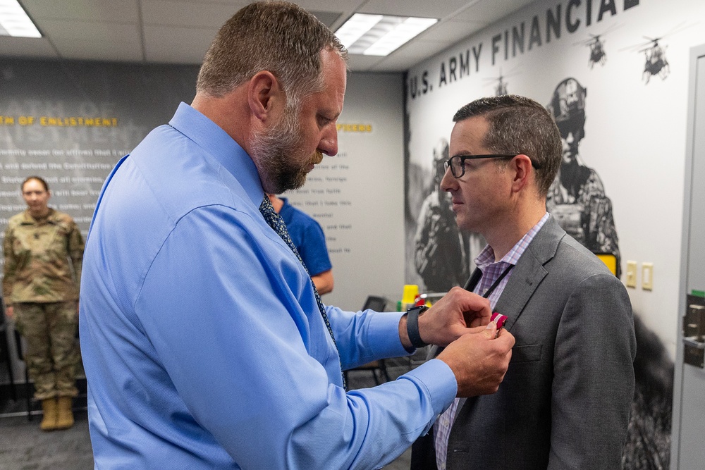 USAFMCOM awards Dunn's meritorious service