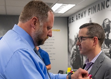 USAFMCOM awards Dunn's meritorious service