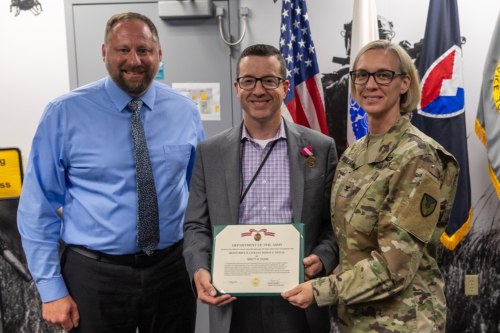 USAFMCOM awards Dunn's meritorious service