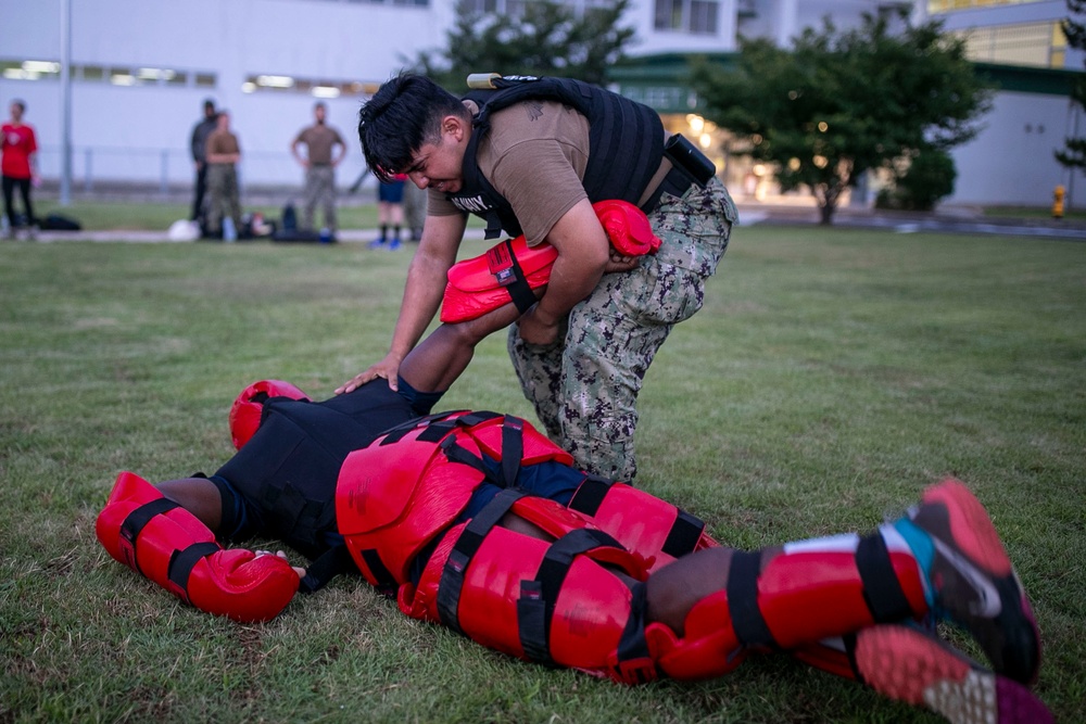 USS Tripoli Sailors Go Through the Non-Lethal Weapons Certification