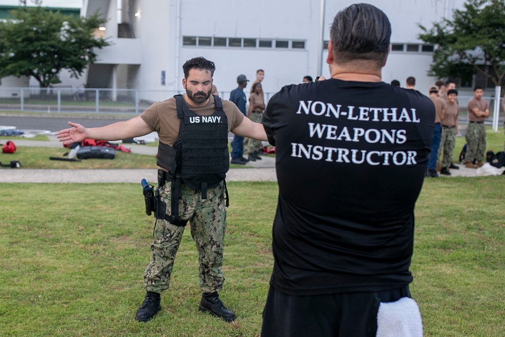 USS Tripoli Sailors Go Through the Non-Lethal Weapons Certification