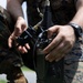 5th Air Naval Gunfire Liaison Company Marines craft expedient antennas with household goods