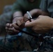 5th Air Naval Gunfire Liaison Company Marines craft expedient antennas with household goods