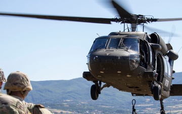 Supplies in the Sky: Multinational KFOR Soldiers Conduct Sling Load Training