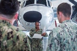 Sailors with Carrier Air Wing 5 touchdown, reunite with families (Radio)