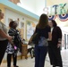 Gina Koehler, spouse of Adm. Steve Koehler, commander, U.S. Pacific Fleet tours facilities on JBER