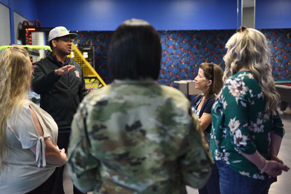 Gina Koehler, spouse of Adm. Steve Koehler, commander, U.S. Pacific Fleet tours facilities on JBER