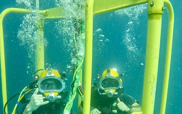 Navy Divers Conduct Operations in the Pacific