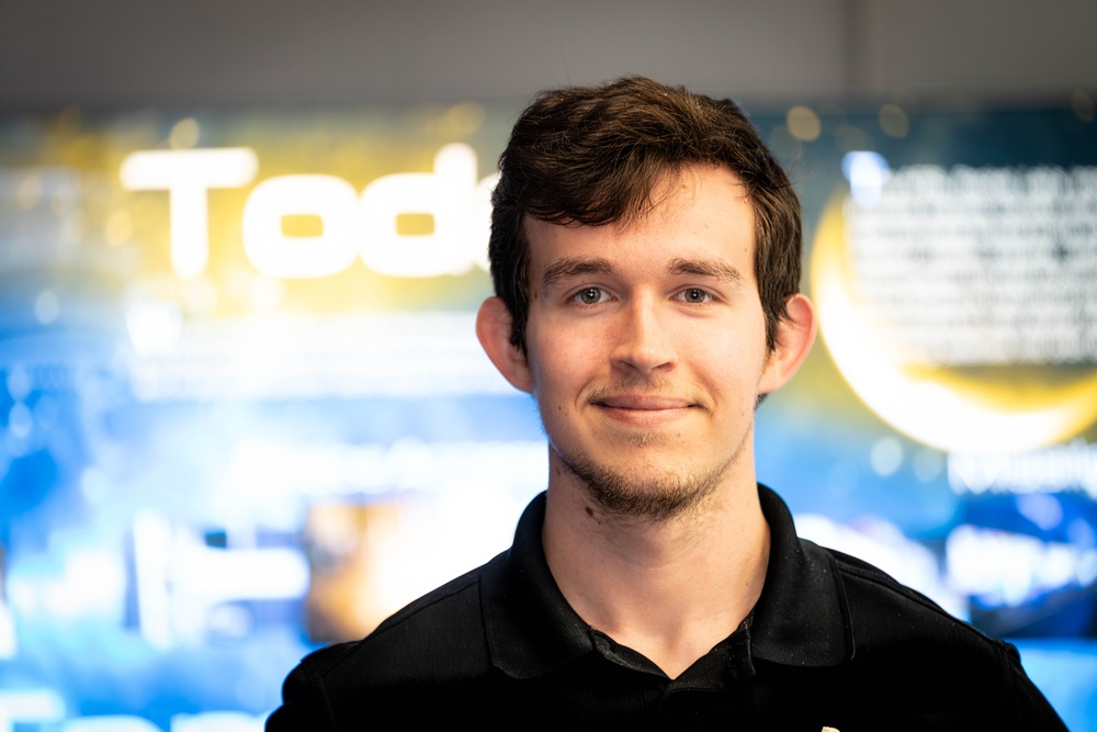 Intern Alexander Glotov Poses for Photo at Edwards Air Force Base