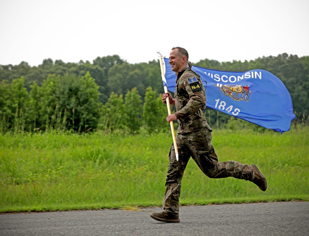 Competitors in the Army National Guard's 2025 National Best Warrior Competition take on the Medal of Honor Run
