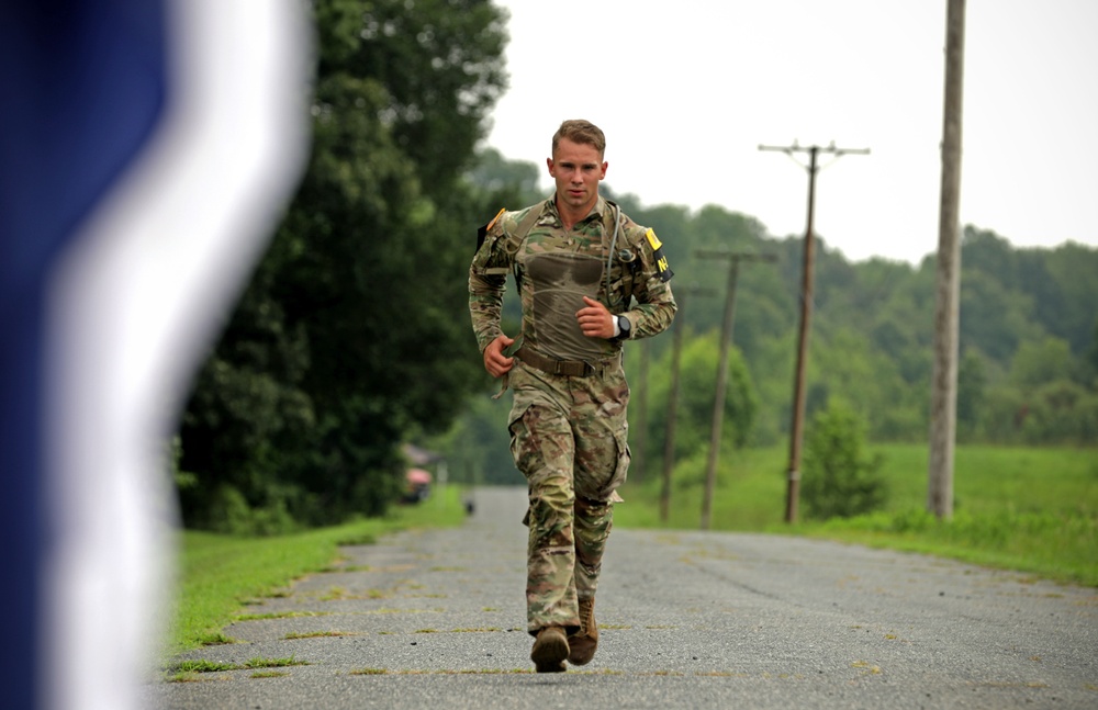 Competitors in the Army National Guard's 2025 National Best Warrior Competition take on the Medal of Honor Run
