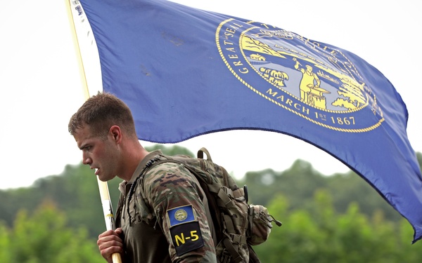 Competitors in the Army National Guard's 2025 National Best Warrior Competition take on the Medal of Honor Run