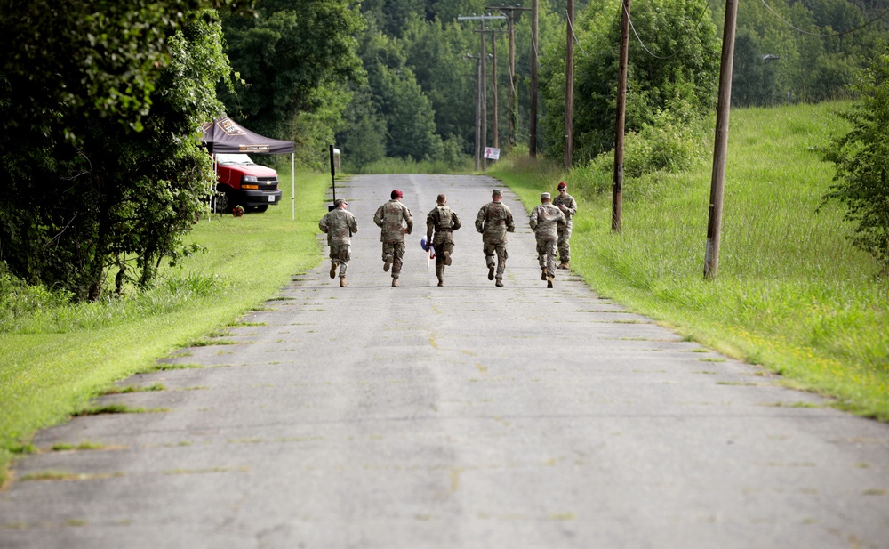 Competitors in the Army National Guard's 2025 National Best Warrior Competition take on the Medal of Honor Run
