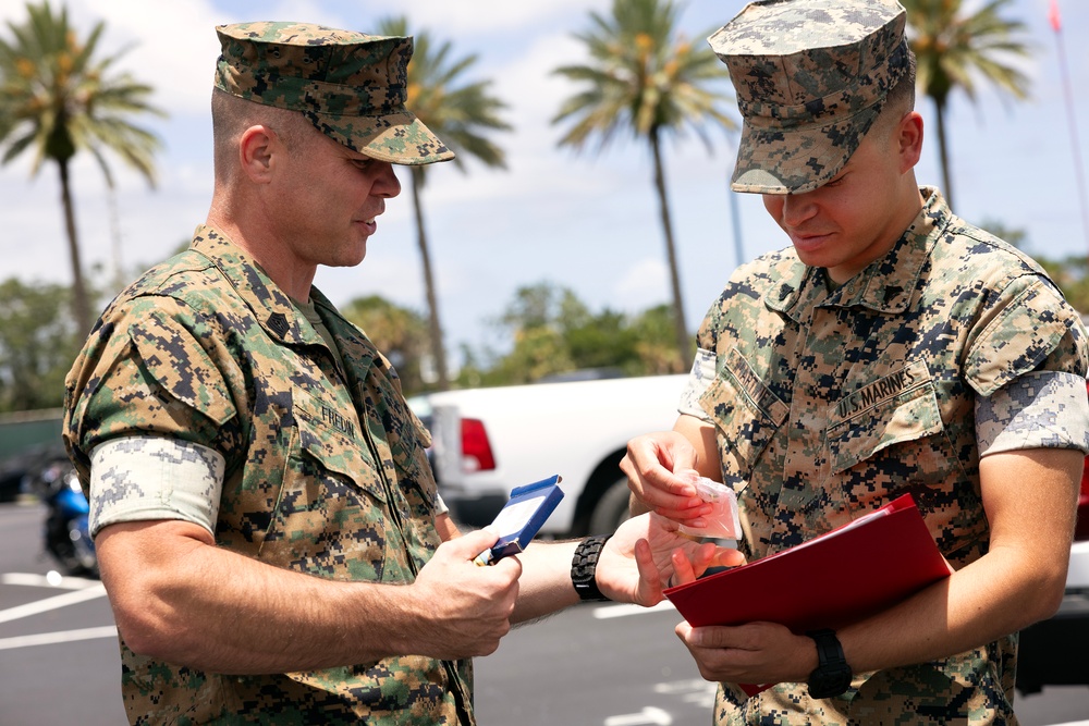 Marine's 500+ Hours with Autism Soccer Earn Top Volunteer Medal
