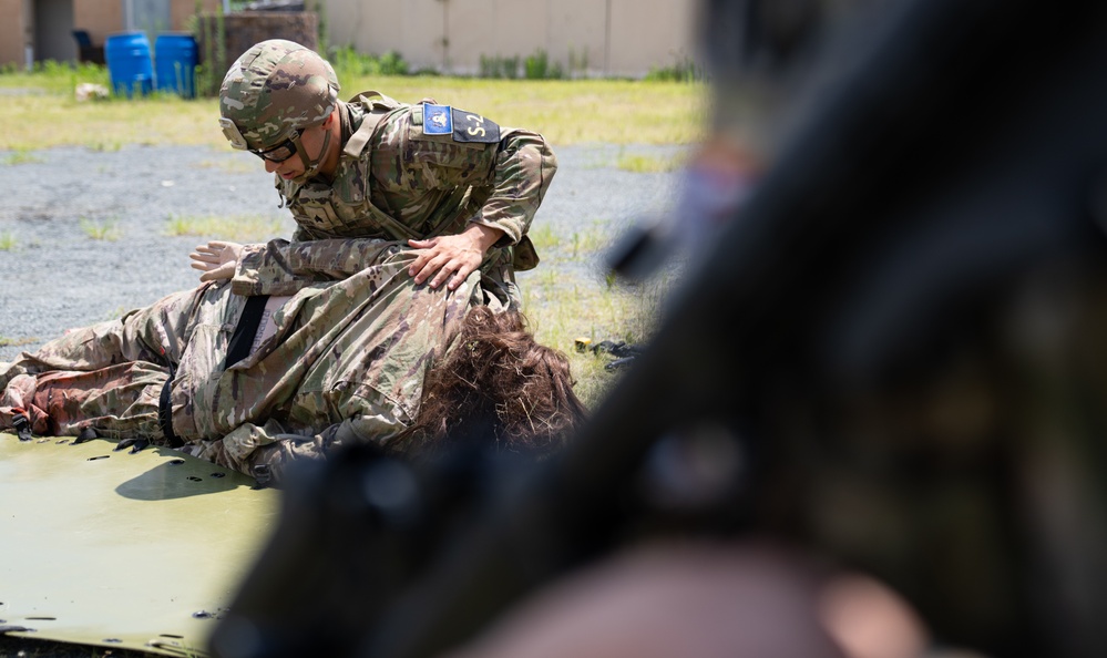 Spc. Robert F. Ruiz-Rhoades participates in tactical combat casualty care lane-2025 National Best Warrior