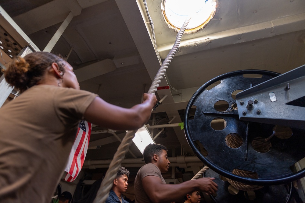 USS PEARL HARBOR (LSD 52) Deck Department Sailors stow lines