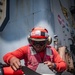 Nimitz Sailor Inspects Ordnance