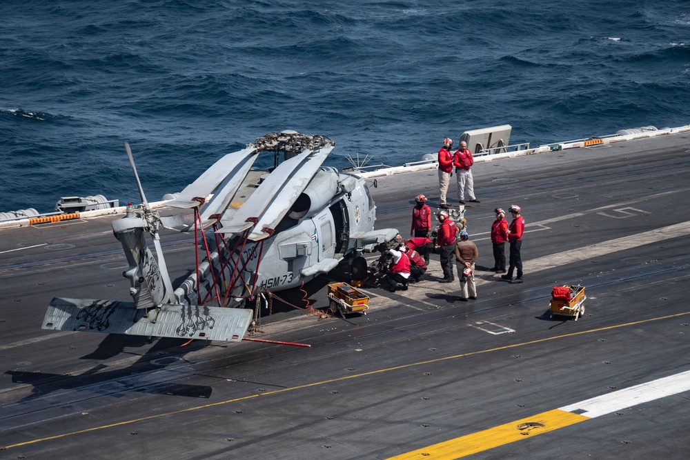 Nimitz Sailors Conduct Maintenance on Aircraft