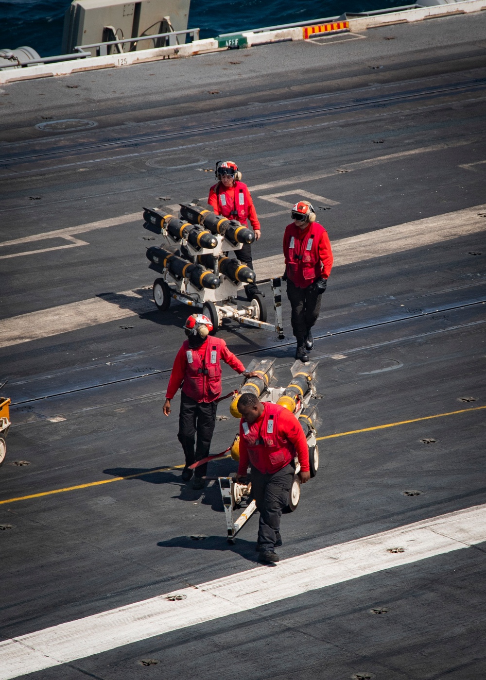 Nimitz Sailors Move Ordnance
