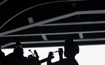 Nimitz Sailor Conducts Routine Maintenance on Aircraft