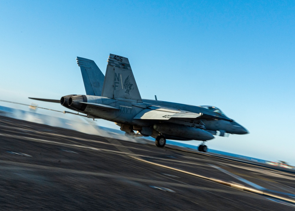 George Washington Conducts Flight Operations at Sunset
