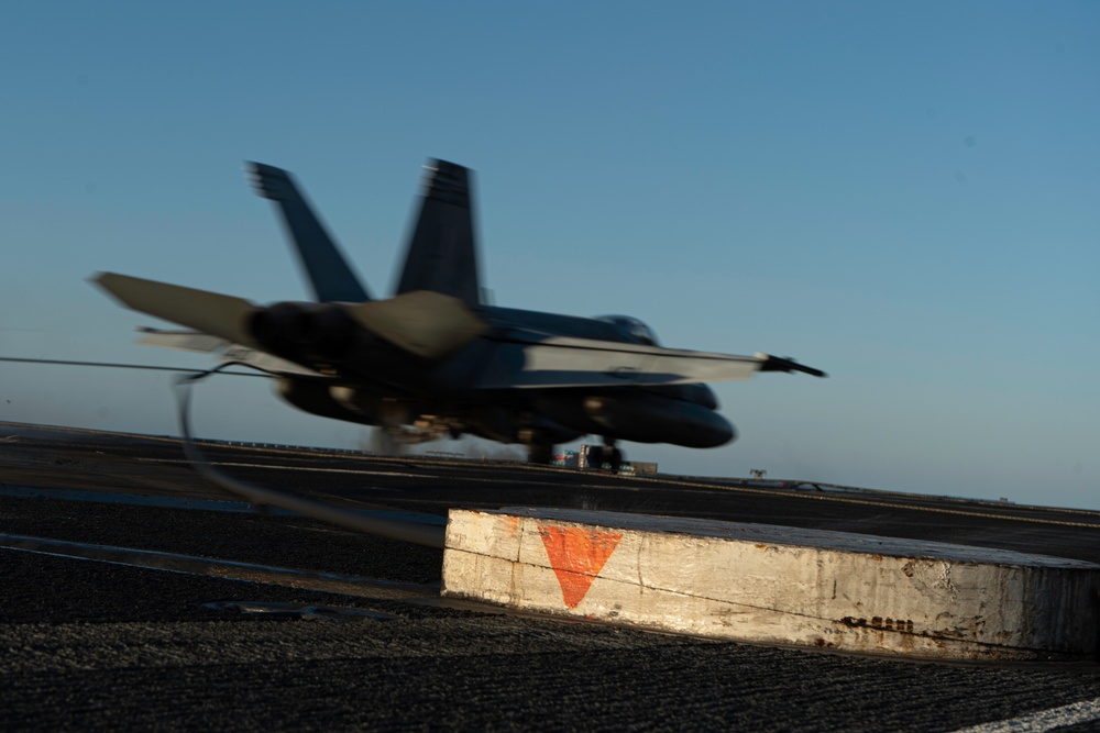 George Washington Conducts Flight Operations at Sunset