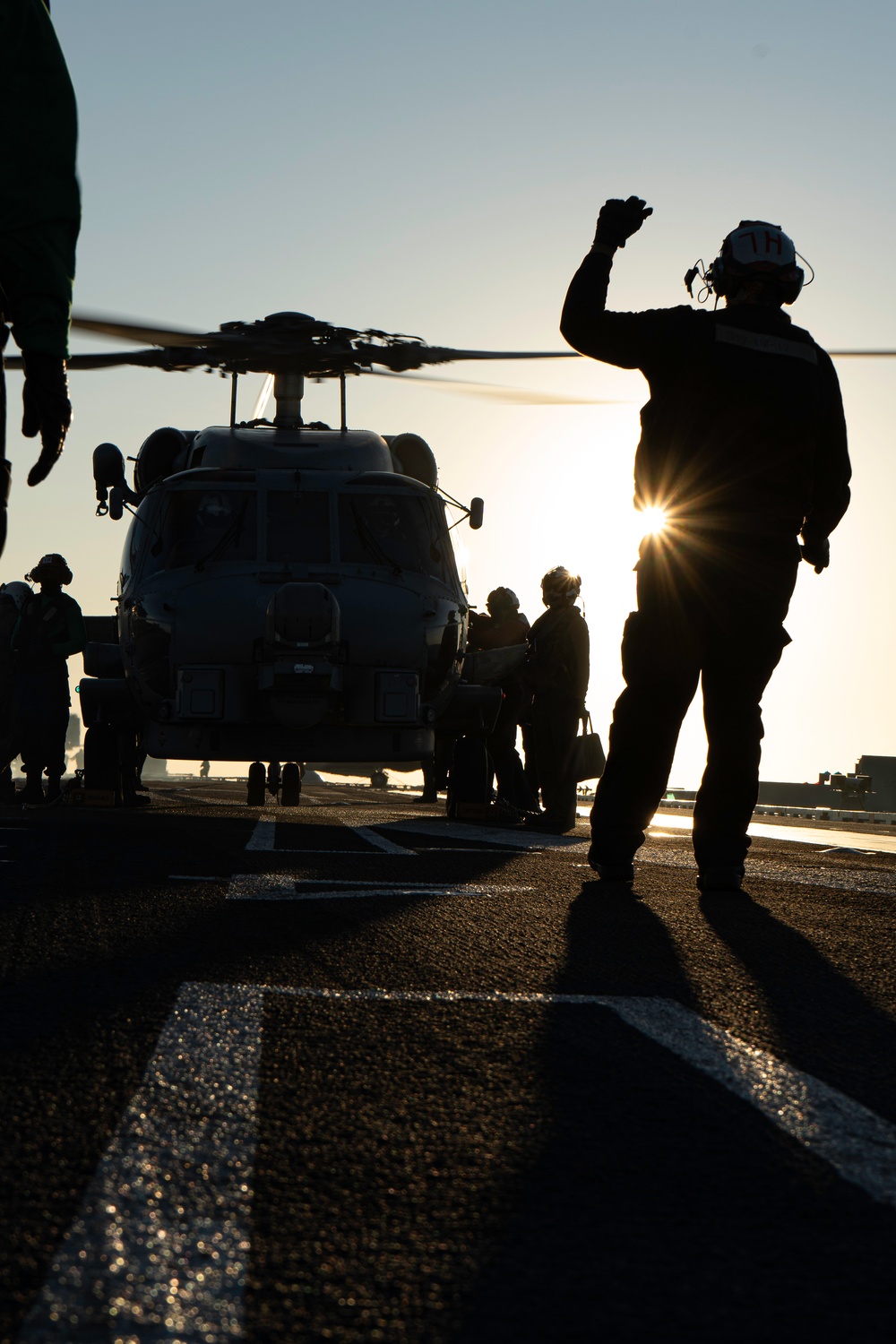 George Washington Conducts Flight Operations at Sunset