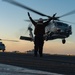 George Washington Conducts Flight Operations at Sunset