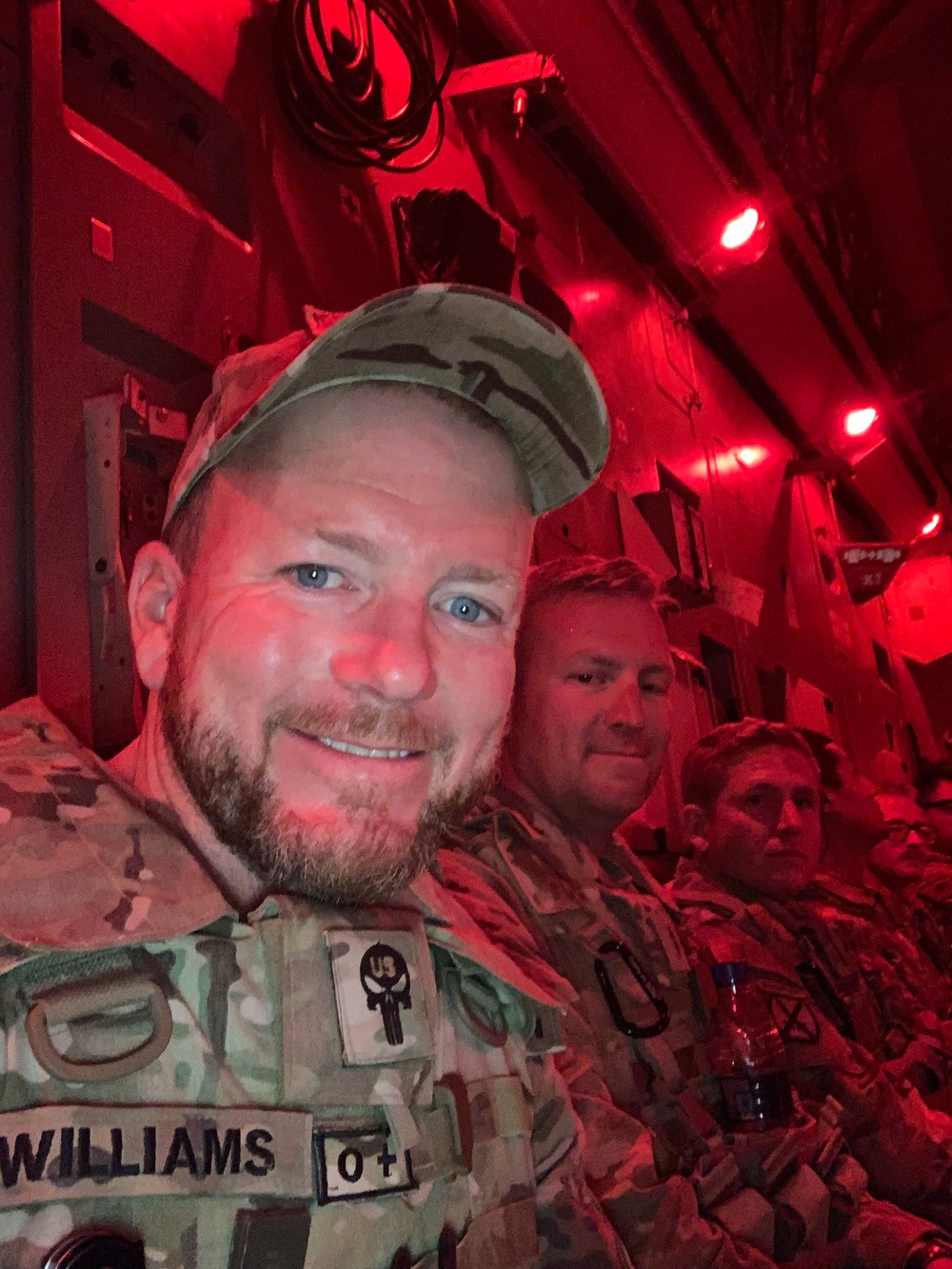 Ryan Williams, a civilian contracting officer technical representative with USACE, sits in the final departing aircraft from FOB Dwyer