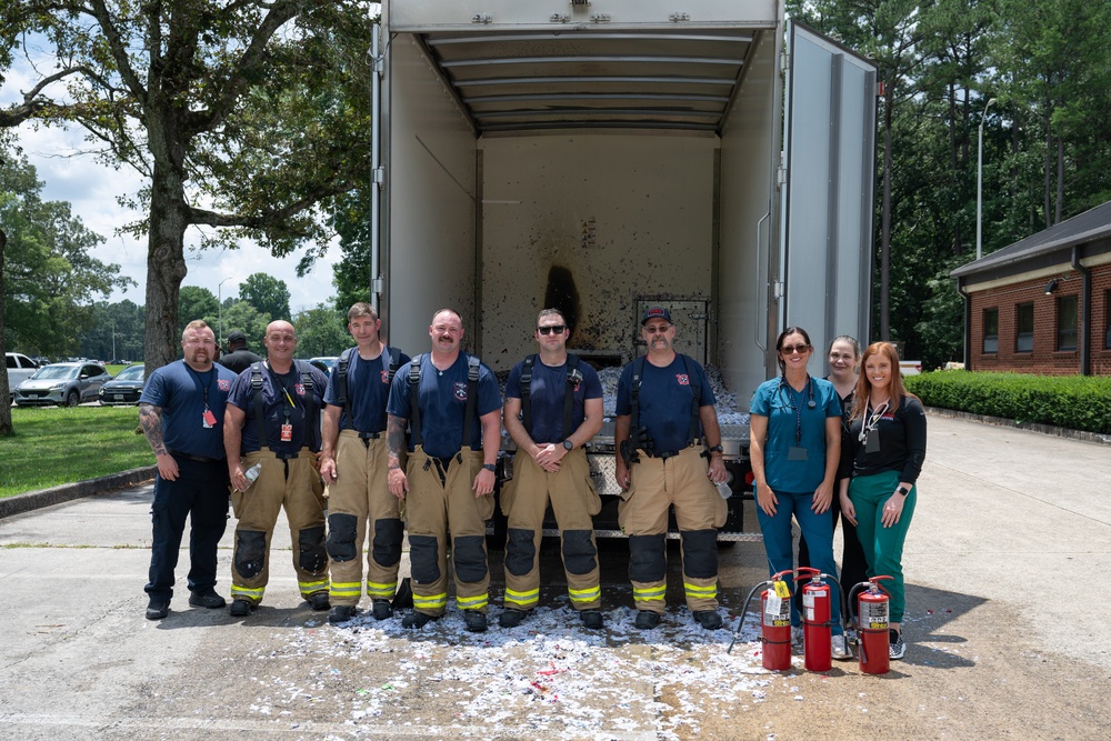 Extinguisher! STAT! Arnold AFB team members help battle truck blaze
