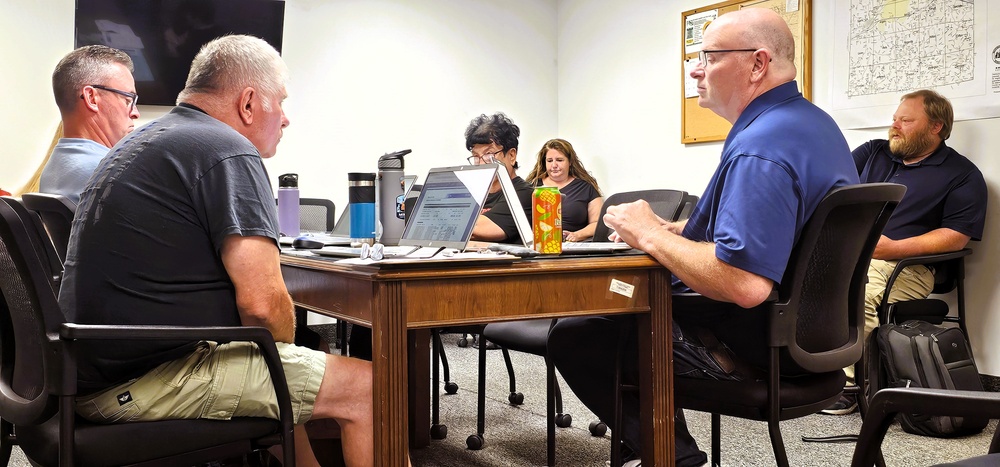 McCoy team members participate in July 2025 meeting of local county natural resources, extension committee, share ongoing efforts