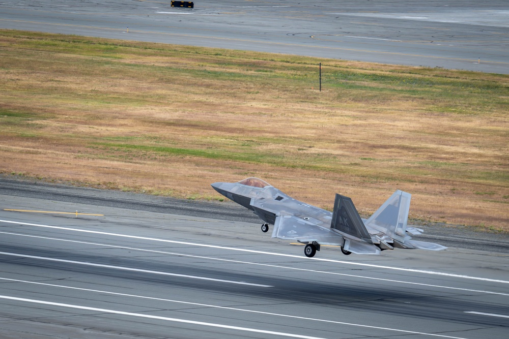 90th Fighter Squadron F-22 Raptors take off to support REFORPAC