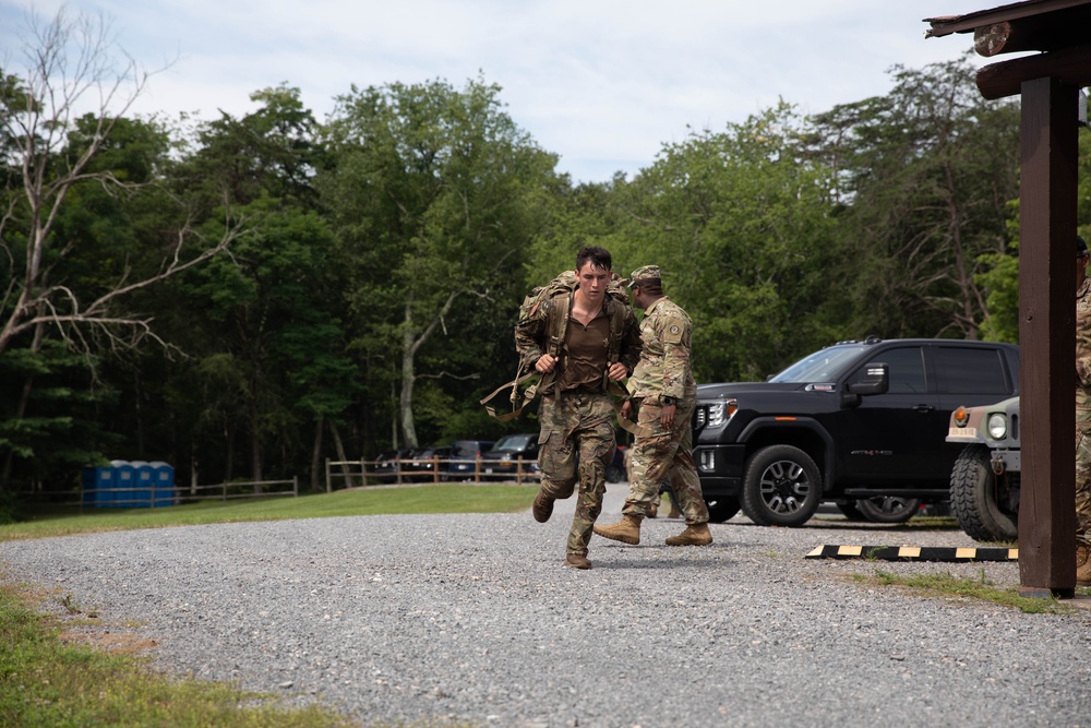 Spc. Canyon Blassingame completes a ruck march - 2025 National Best Warrior