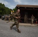 Staff Sgt. Brandon M. Byrne completes a ruck march - 2025 National Best Warrior