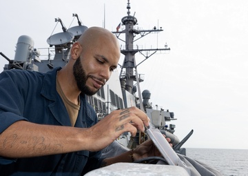 Curtis Wilbur Sailor Conducts Maintenance
