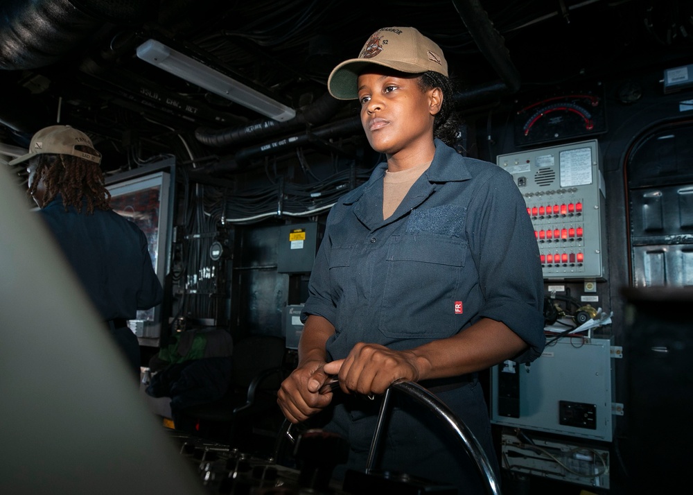 USS Pearl Harbor (LSD 52) U.S. Navy Sailors perform bridge operations