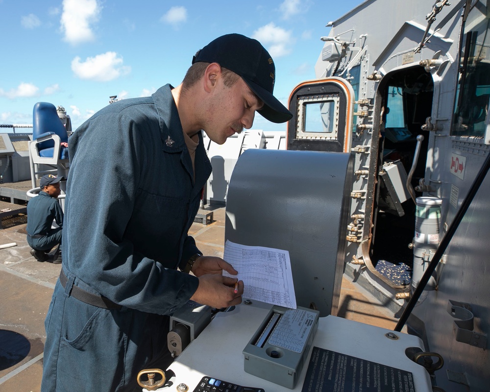 USS Pearl Harbor (LSD 52) U.S. Navy Sailors perform bridge operations
