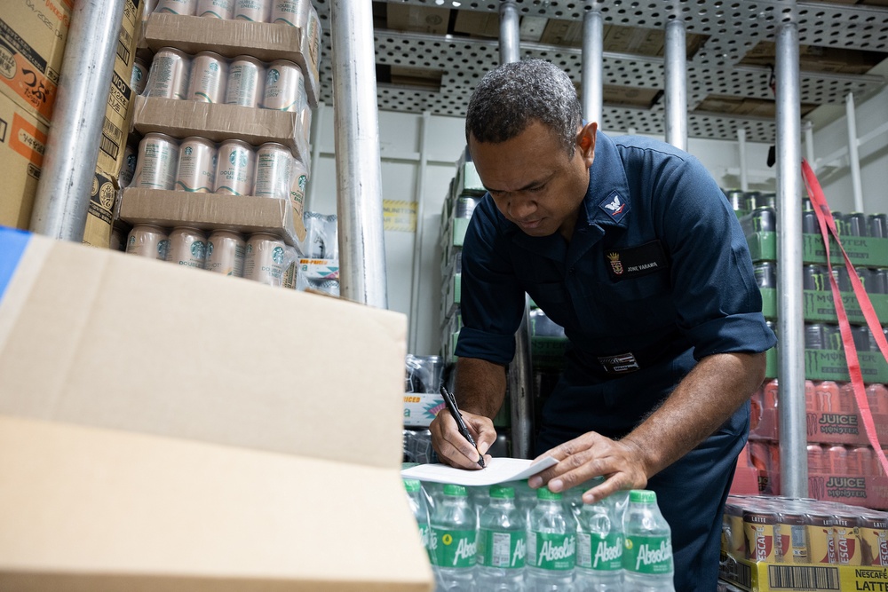 Curtis Wilbur Sailor Conducts Inventory