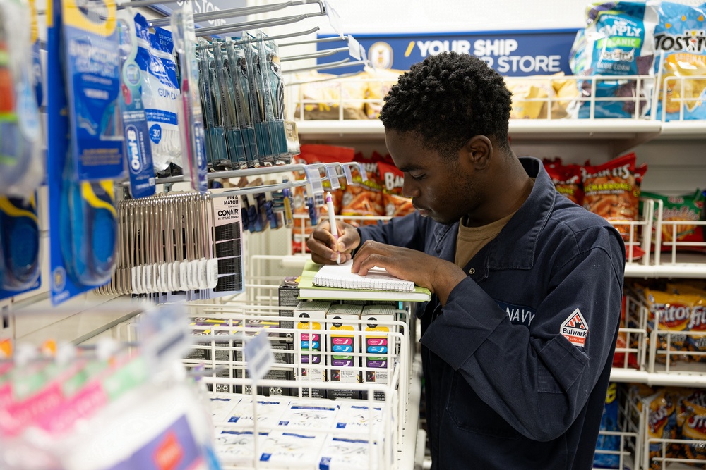 Curtis Wilbur Sailor Conducts Inventory