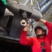 Helicopter Maritime Strike Squadron 70 Sailor Conducts Maintenance