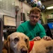 USS Gerald R. Ford (CVN 78) Expeditionary Facility Working Dog Greets Sailors