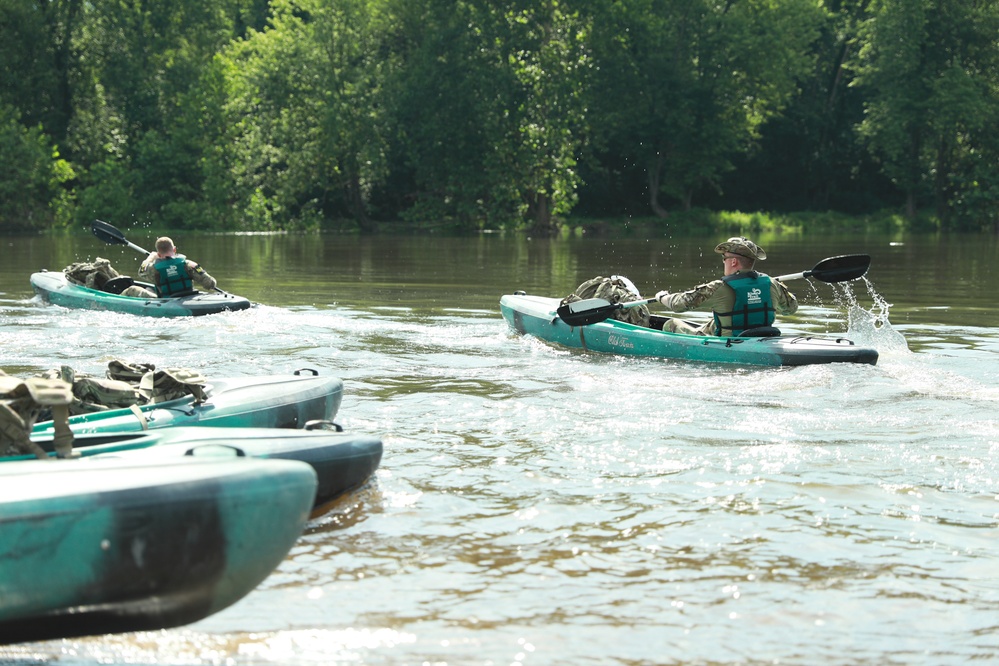 Competitors kayak in River Operations - 2025 National Best Warrior