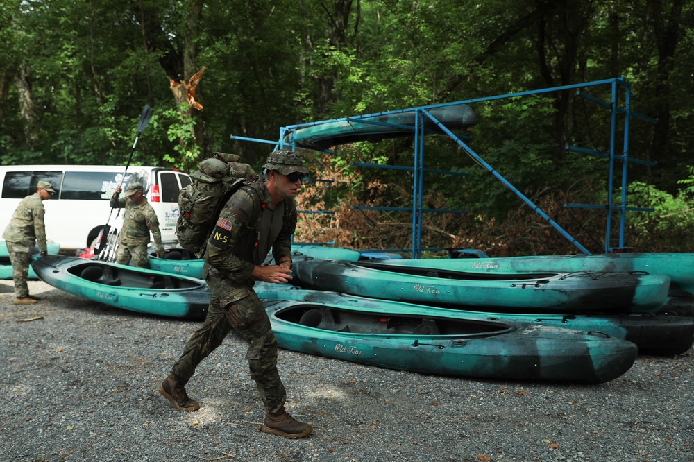 Sgt. Luke Entz embarks with rucksack in River Operations - 2025 National Best Warrior