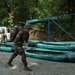 Sgt. Luke Entz embarks with rucksack in River Operations - 2025 National Best Warrior