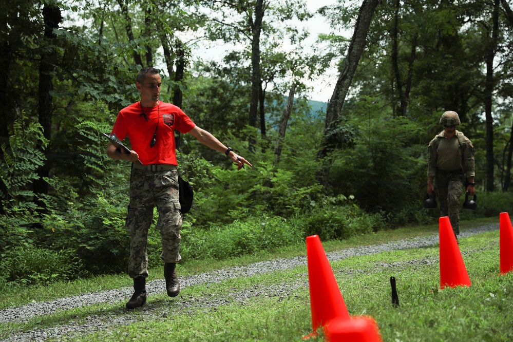 Sgt. 1st Class Matija Ivakovic grades competitor - 2025 National Guard Best Warrior