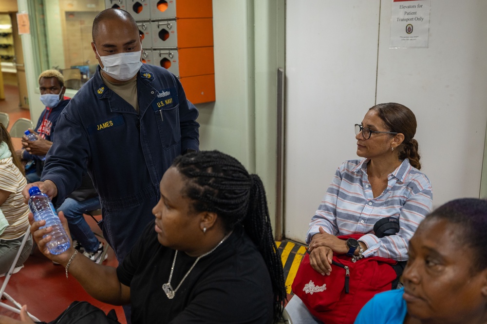 Dominican Republic Partients Board USNS Comfort CP25
