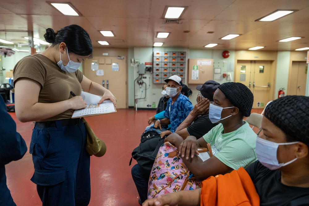 Dominican Republic Partients Board USNS Comfort CP25