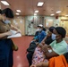 Dominican Republic Partients Board USNS Comfort CP25