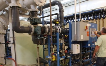 Radford Army Ammunition Plant employee checking configurations in one of the plant's two drinking water facilities.