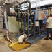 Radford Army Ammunition Plant employee checking configurations in one of the plant's two drinking water facilities.